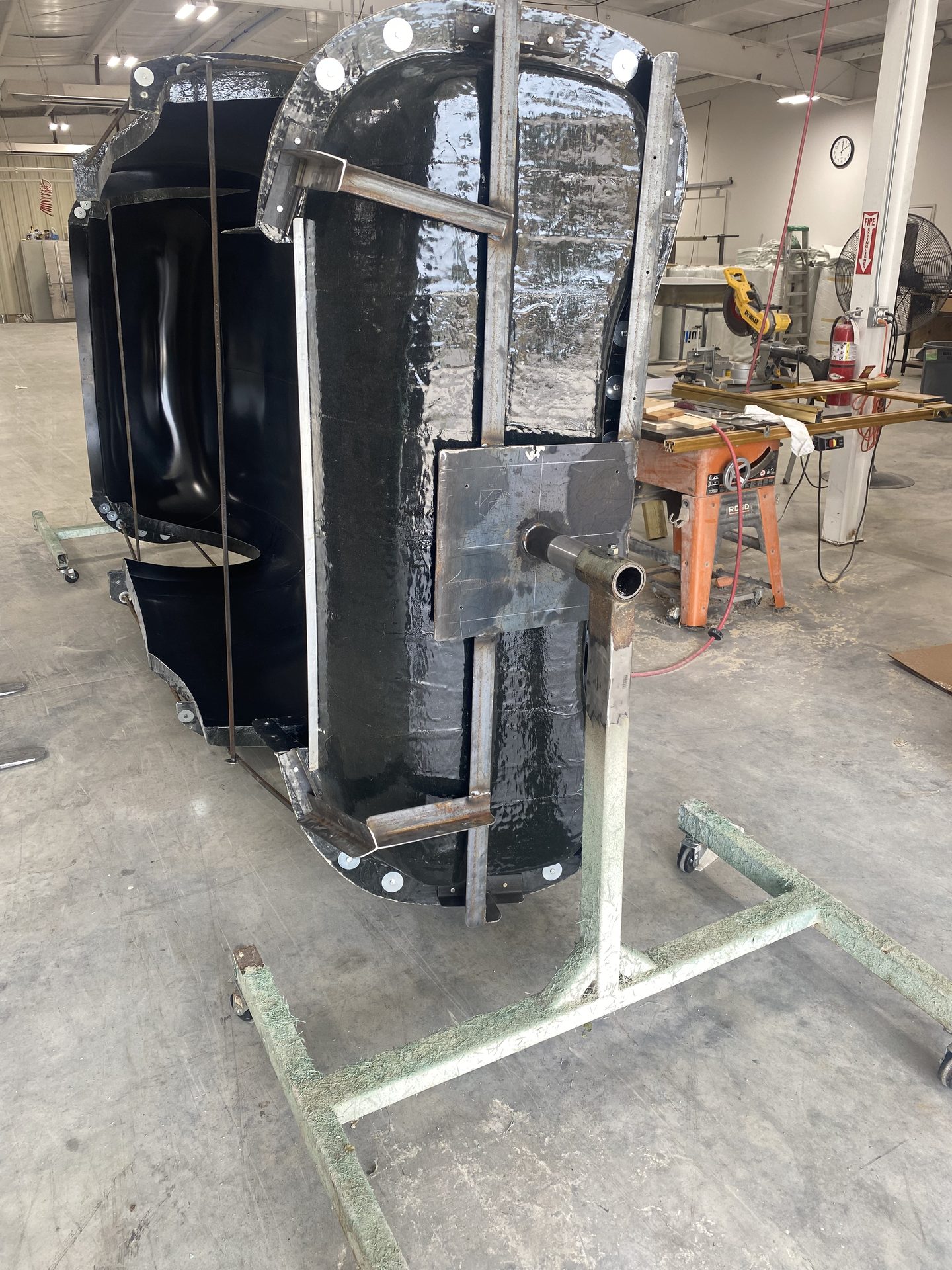 Vehicle body mold halves standing in the shop