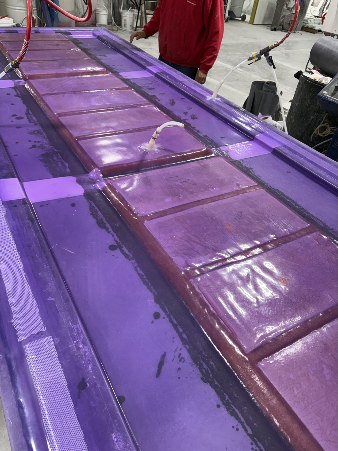 Purple silicone membrane sealed over panel tooling